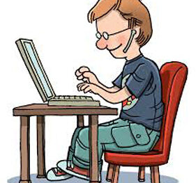 man typing at table